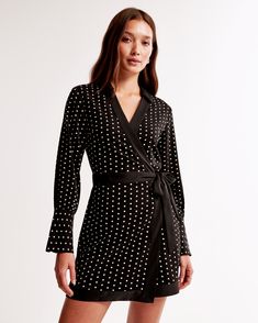 Elevate your wardrobe with the timeless elegance of the Abercrombie & Fitch Women's Long-Sleeve Wrap Mini Dress. Perfect for any occasion, this chic ensemble in a captivating Black Dot pattern ensures you stand out with style and grace.

- **Size**: XXS PETITE
- **Color**: Black Dot
- **Material**: Body: Polyester, Lining: Polyester
- **Gender**: Female
- **Design Features**: V-neckline with classic collar, crossover bodice, self-tie wrap skirt

Crafted from drapey synthetic fabric, this dress o Formal Fitted Long Sleeve Wrap Dress, Formal Long Sleeve Fitted Wrap Dress, Long Sleeve Wrap Dress For Date Night, Fitted Long Sleeve Wrap Dress For Date Night, Chic Long Sleeve Wrap Dress For Work, Chic Long Sleeve Wrap Dress For Evening, Black Mini Dress With Surplice Neckline For Work, Fall Date Night Wrap Dress With Long Sleeves, Fall Date Night Long Sleeve Wrap Dress