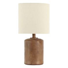 a wooden table lamp with a white shade on it's base and a beige linen lampshade