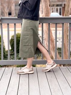 The Callen Cargo Skirt is the perfect blend of casual and chic, ideal for any adventure that comes your way. The cargo-style pockets add a playful twist. This skirt is the epitome of cool, making it the ultimate choice for fun and fashionable days ahead! Item Details: Midi Length Cargo Pockets Button Waist Closure Belt Cargo Style, Cargo Skirt, Midi Length, Twist, Skirt