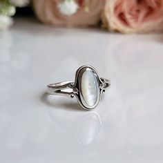 A gorgeous oval Mother of Pearl ring. Made with sterling silver and mother of pearl heart. Multiple sizes available. Mother Of Pearl Ring, Pearl Heart, Ring Sterling Silver, Pearl Ring, Sterling Ring, Sterling Silber, Sterling Silver Ring, Mother Of Pearl, Silver Ring