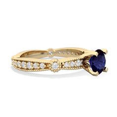 This exquisitely detailed 6mm round sapphire engagement ring in 14K Yellow Gold, is a perfect mix of art-deco and antique ring styles. Milgrain accents border a row of diamonds up and down the band for a total of {diamondcarats}, with a sparkling deep blue sapphire as the star on the top. Available with many different center stones, and with a matching wedding band. Luxury Yellow Gold Rings With Lab-created Sapphire, Round Sapphire Engagement Ring, Oval Sapphire Engagement Ring, London Topaz Ring, Turquoise Ring Engagement, Alexandrite Jewelry, Tanzanite Engagement Ring, Blue Topaz Engagement Ring, Blue Topaz Jewelry