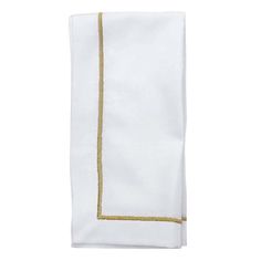 a white towel with gold trim on it