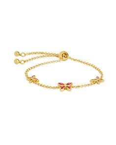 Transform your style with the exquisite elegance of the Caria Bolo Bracelet. Adorned with a delicate butterfly and shimmering CZ stones, this adjustable bracelet adds a touch of luxury to any ensemble. Elevate your look and capture attention with this one-of-a-kind piece. Materials: 14K gold or rhodium plated brass, cubic zirconia Features: Measures 9" length, 0.25" & 0.35" charms, 1.5mm chain, 3.5mm & 4.5mm CZ stones, Lead & Nickel free, bolo/sliding knot- one size fits most Adjustable Rose Gold Jewelry With Butterfly Charm, Rose Gold Adjustable Jewelry With Butterfly Charm, Adjustable Gold Butterfly Jewelry, Delicate Adjustable Yellow Gold Charm Bracelet, Adjustable Butterfly Gold Jewelry, Adjustable Butterfly Shaped Yellow Gold Jewelry, Adjustable Yellow Gold Bracelets For Party, Delicate Adjustable Gold Bracelet For Formal Occasions, Adjustable Pink Chain Bracelet