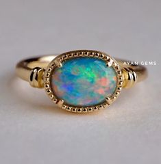 Gemstone  Natural Ethiopian opal Stone shape  Oval Band colors  Silver/ Gold /Rose gold  Silver purity  925 sterling  Style  Art Deco Ring For  Girls / Women Ring size  All Available  Our Business Policy   Shipping Time & Delivery Time:    Orders will be shipped between 4 to 7 days   Payment Terms :  We Accept Payment Through PayPal ONLY.   Return Policy:  *       You May Return Your Order Within 7 Days From The Date of Delivery. *       The Item Must be Returned In Its Original Condition. * Fine Jewelry Oval Multi-stone Opal Ring, Oval Multi-stone Opal Ring Fine Jewelry, Fine Jewelry Opal Oval Cabochon Ring, Handmade Oval Opal Ring Fine Jewelry, Handmade Oval Opal Ring In Fine Jewelry Style, Fine Jewelry Opal Ring Oval Cabochon Birthstone, Heirloom Style Opal Ring Gift, Classic Multi-stone Opal Jewelry, Classic Opal Multi-stone Jewelry