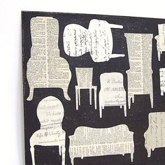 a black and white collage of chairs, books, and paper on a wall