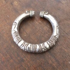 Vintage hallow coin silver Taru people of Himalayas cuff bracelet one of kind jewelry.Inner width; 62mmHeight ; 17mm Silver Spiritual Bangle For Festivals, Silver Round Bohemian Bangle, Artisan Silver Cuff Bracelet For Festival, Bohemian Sterling Silver Cuff Bracelet For Festivals, Unique Silver Bracelets For Festivals, Unique Silver Bracelet For Festivals, Traditional Nickel-free Silver Cuff Bracelet, Traditional Silver Nickel-free Bangle, Bohemian Silver Stamped Bangle