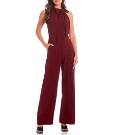 Shop for Vince Camuto Sleeveless Bow Neck Jumpsuit with Pockets at Dillard's. Visit Dillard's to find clothing, accessories, shoes, cosmetics & more. The Style of Your Life. Solid Color Strapless Jumpsuit For Work, Solid Strapless Overall Jumpsuit For Work, Solid Strapless Jumpsuit For Work, Sleeveless Solid Color Workwear Pantsuit, Solid Sleeveless Pantsuit For Work, Chic Sleeveless Overalls For Workwear, Chic Overalls For Workwear, Chic Fitted Jumpsuits And Rompers With Bib Front, Fitted Chic Overalls For Workwear