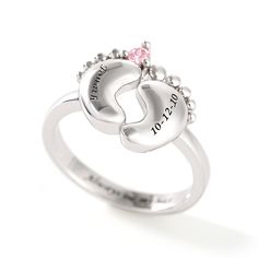 Looking for that one of a kind new mom jewelry gift? She's certain to love our adorable Baby Feet Personlized Ring. Perfect for wearing on its own or stacking with other rings, it's just right for pairing with all of mom's favorite looks while keeping thoughts of her little one close to her heart. This engraved jewelry gift is perfect for any occasion – whether a birthday or holiday is coming, or if you're simply searching for the ideal way to celebrate her new baby's birth! A sparkling birthstone in your choice of colors provides a hint of color and sparkle. Choose baby's name, mom's name, or even a meaningful word to make this gift an extra-special one she'll cherish for years to come. Weight: 2.3 gWidth: 2 mmHeight: 3 mmThickness: 0.9 mmMaterial: 925 SilverPlating Color: Silver Silver Stackable Rings For Mother's Day Promise, Personalized Adjustable Ring Jewelry, Personalized Adjustable Fine Jewelry, Hypoallergenic Promise Ring For Mother's Day, Personalized Silver Stackable Rings For Mother's Day, Personalized Pink Ring For Birthday, Personalized Pink Birthday Ring, Cute Anniversary Jewelry For Valentine's Day, Mother's Day Gift Birthstone Ring In Sterling Silver