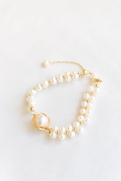 SKYE | SHOP WOMEN | NEW ARRIVALS | FREE SHIPPING & RETURNS Gold 14k Gold-filled Round Beads Pearl Bracelet, Feminine Gold Round Beaded Jewelry, Feminine Gold Jewelry With Round Beads, Elegant Gold Bracelet With Baroque Pearl, Delicate Baroque Pearl Chain Bracelet, Delicate Baroque Pearl Bracelet With Pearl Chain, Delicate Baroque Pearl Bracelet, Classic Gold Pearl Drop Bracelet, Classic Gold Pearl Beaded Bracelets