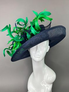 🐝 Make your statement with this stunning piece!  🐝 Navy blue sinamay hat base adorned with green feathers for a "wow factor" look! ♥Head circumference: 22.5" and adjustable to fit sizes smaller than 22.5" ♥Ultra Light & comfortable to wear. ♥Packed and shipped in a sturdy box with special love & care to ensure a safe delivery. ♥Includes a hat care card with instructions on how to care for & keep your piece beautiful. ♥Over 27,000 pieces sold & 4,000 5 star reviews. Our "Hive Girls" come back y Navy Blue Hat, Green Feathers, Formal Hat, Hat Tea Party, Sinamay Hats, Couture Hats, Church Hat, Hat Base, Tea Party Hats