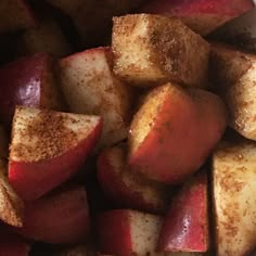 there is a white bowl filled with apples and cinnamon on the side, ready to be eaten