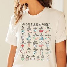 a woman wearing a school nurse alphabet t - shirt