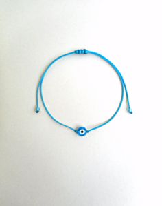 Kabbalah red string light blue evil eye bracelet.Wear it like Madonna! This simple yet beautiful bracelet is made using durable red waxed string and has a glass beed evil eye charm in the middle,and light blue glass seed beads at the ends. The diameter of the flat eye bead is 7mm approx. It is adjustable with a sliding knot closure. Similar bracelets: https://www.etsy.com/listing/219992721/blue-evil-eye-in-red-stringsimple?ref=pr_shop , https://www.etsy.com/listing/222844772/blue-evil-eyesimple- Red String Lights, Blue String Lights, Sliding Knot Closure, Sliding Knot, Blue Evil Eye, Minimalist Bracelet, Spiritual Jewelry, Evil Eye Charm, Pricing Jewelry