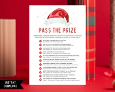 a christmas card with the words pass the prize and santa's hat on it