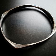 One Of A Kind, Solid Sterling Silver Bangle Bracelet. Heavy. Hammered. Unique Because Of Its Design. Rounded In The Center But Squared On The Outside. If You Like Sterling Silver This Bracelet Is Stunning! Modern Hand Forged Bangle Bracelet, Everyday Hand Forged Bangle Bracelets, Flexible Sterling Silver Bangle Bracelet Gift, Hand Forged Metal Bracelets As Gift, Hand Forged Metal Bracelet As Gift, Modern Hand-forged Bangle As Gift, Hand Forged Round Bracelets As Gift, Hand Forged Bracelets As Gift, Hand Forged Bangle Bracelets As Gift