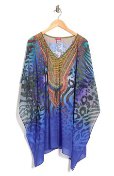 Unleash your free boho spirit in this poncho styled with vivid allover prints. 34'' length (O/S) V-neck Kimono sleeves All-over print Woven 100% polyester Dry clean Imported Model stats: 5'10", 32" bust, 25" waist, 36" hip. Model is wearing size OS. Bohemian Multicolor Print V-neck Kaftan, Bohemian Blue Kaftan With Vibrant Print, Multicolor Boho Print V-neck Kaftan, Bohemian Blue Poncho For The Beach, Blue Bohemian Poncho For Spring, Bohemian Blue Printed Cover-up, Blue Long Sleeve Poncho For Festivals, Bohemian Long Sleeve Blue Poncho, Blue Long Sleeve Festival Poncho