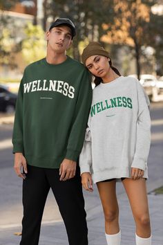 This super cool vintage style Wellness sweatshirt for athleisure lovers. Order a size up if you like oversized look. ------------------------------------------------------------------------------------------------------------------------------------------------- * 50% cotton, 50% polyester * Pre-shrunk * Classic fit with no center crease * 1x1 athletic rib knit collar with spandex * Air-jet spun yarn with a soft feel and reduced pilling ----------------------------------------------------------- Oversized Crew Neck Sweats For Sports Season, Sports Crew Neck Sweater With Letter Print, Sports Sweater With Letter Print And Crew Neck, Letter Print Crew Neck Sports Sweater, Crew Neck Sweater With Letter Print For Sports, Letter Print Crew Neck Sweater For Sports, Urban Crew Neck Tops For Leisure, Urban Crew Neck Activewear, Fall Streetwear Athleisure T-shirt