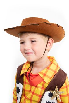 Your little Cowboy will be ready to go to the rodeo and wrangle some cows in their new Cowboy Hat! One Size Fits Most Brown sturdy felt with a thick brown stitching around brim of hat Brown drawstring with a toggle, easily adjustable and hold secure Inner circumference of 20.5" Matching Cowboy Dress Up Sold Separately Adjustable Brown Felt Hat For Country Events, Adjustable Brown Costume Hats For Rodeo, Brown Adjustable Costume Hat For Rodeo, Adjustable Brown Country Costume Hat, Brown Adjustable Country Costume Hats, Brown Felt Hat For Rodeo, Adjustable Western Brown Costume Hats And Headpieces, Country Style Brown Costume Hat For Rodeo, Brown Country Style Costume Hat For Rodeo