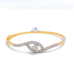 PRODUCT DETAILS Gold Purity(karat): 18k Item Weight(grams): 10.8 Item Finish: Yellow Gold Stone: Diamond Diamond Weight(carats): 0.99 ct Diamond Color: F-G Diamond Quality: VS Diamond Shape: Round Brilliant Cut Bangle Size: 2.3 Bangle Opening: 2.2" Bangle Opening Shape: Oval Openable: Yes, Hinge + Clasp w/Lock Luxury Diamond Bracelet With Marquise Cut, Luxury Diamond Marquise Bracelets, Luxury Marquise Diamond Bracelets, Gold Marquise Diamond Bracelets, Luxury Diamond Bracelets With Marquise Cut, Gold Marquise Diamond Bracelet For Wedding, Luxury Diamond Bracelet Marquise Cut, Luxury Marquise Cut Diamond Bracelet For Anniversary, Formal Marquise Diamond Bracelet With Diamond Accents