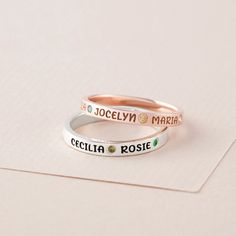 Customed with kids' names and birthstones, this ring is a meaningful present for mom or grandma on any occasion. P R O D U C T ∙ I N F O * Material: Solid 925 Sterling Silver * Finishing: Silver - Gold - Rose Gold * Ring's band is 1/8'' (2.8 mm)  * By default, silver items comes with BLACK engraving and gold-plated item comes with CLEAR engraving. H O W * T O * O R D E R 1. Select your preferred COLOR, NUMBER OF BIRTHSTONES and RING SIZE from the menu. 2. Let us know the KIDS' NAMES and BIRTHSTO Personalized Engraved Rose Gold Ring, Sterling Silver Name Rings For Birthday, White Name Jewelry For Birthday, Custom Name White Rings For Anniversary, Sterling Silver Rings With Names For Birthday, Personalized White Stackable Rings For Anniversary, White Jewelry With Names For Birthday, Personalized Name Rings For Birthdays, Personalized Name Rings For Birthday