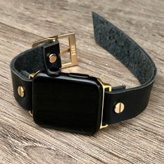 18mm Wide Soft Genuine Leather Strap Bracelet Features Gold Filled Stainless Steel Connectors With Gold Plated Brass Metal Buckle & Rivets Fashion Wristband For Apple Watch Series 6 5 4 3 2 1 Designed & Handmade By Simeon D Jewelry Studio Please Measure Your Wrist As Pictured & Select Size Each Size Is Slightly Adjustable For Perfect Fitment Elegant Stylish Gift Idea For Any Holiday Or Occassion Not For Other Models. Apple Smartwatch Is Not Included Black Leather Strap Apple Watch Band For Everyday Use, Black Bracelet Strap Apple Watch Band For Everyday, Adjustable Black Watch Band With Wrist Strap, Adjustable Gold Leather Watch Bands, Luxury Adjustable Black Apple Watch Band, Elegant Black Leather Apple Watch Band, Black Bracelets With Strap For Everyday Use, Black Bracelet For Everyday Use, Luxury Rectangular Black Band Watch Accessories