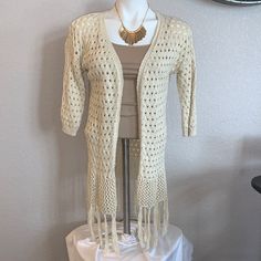 Super Cute And Dainty Cardigan; Never Worn; Like New. Fitted Open Knit Cardigan For Layering, Open Front Knit Sweater, Fitted Open Knit Cardigan, Fitted Beige Open Knit Outerwear, Long Knit Sweater For Spring, Fitted Open Knit Casual Cardigan, One Size Knitted Sweater For Spring, Pointelle Knit Cardigan For The Beach, Beach Pointelle Knit Cardigan