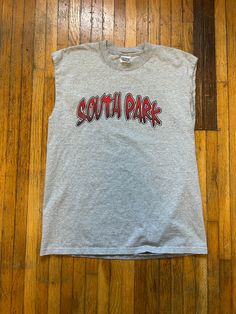 Here's a South Park T-shirt from the 1990s! Features cutoff sleeves and graffiti font. Gilden tag. Look Kool when wearing this T-shirt and stand out from the rest of the crowd. Condition: Good. No holes or stains. Sleeves have been cut off. Style: Y2K Brand: Gilden Color: Gray/Red Size: Large Refer to measurements Pit to pit: 20" Top to bottom: 27" Please don't hesitate to ask any questions. Thanks for looking! South Park Shirt, Y2k Graffiti, Tv Comedy, Graffiti Font, Prom Looks, Sleeveless T Shirt, Comedy Tv, Sleeveless Tshirt