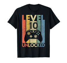 a black t - shirt with an image of a video game controller that says level 10 unlocked