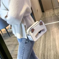 #SS0520 Material: PU Color: black, white Size: 19cm*12cm*7cm Shoulder strap length: 120cm Shipping: Free Shipping Worldwide for order over 15$, 7-15 days delivery to US/UK/CA/AU/FR/DE/IT and most Asia Countries Trendy White Shoulder Bag, White Casual Bags As Fashion Accessory, Cute White Shoulder Bag For Party, Trendy Bags With Cat Design, Trendy Cat Design Crossbody Shoulder Bag, Trendy White Rectangular Phone Bag, Trendy Crossbody Shoulder Bag With Cat Design, Trendy White Phone Bag With Adjustable Strap, White Rectangular Phone Bag For Party