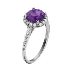 Decorated with purple and white cubic zirconia stones, this halo ring offers understated elegance. Comes in a gift box. Click on this JEWELRY & WATCHES GUIDE to learn about fit, styles, materials and more!RING DETAILS Width: .43 in. Metal: rhodium-plated sterling silver CUBIC ZIRCONIA DETAILS Cut: round Color: purple, white Setting: prong  Size: 9. Gender: female. Age Group: adult. Cubic Zirconia Birthstone Promise Ring With Halo, Formal Birthstone Ring With Halo And Round Cut, Purple Cubic Zirconia Birthstone Ring, Cubic Zirconia Birthstone Ring With Halo Setting, Fine Jewelry Cubic Zirconia Birthstone Ring With Halo Setting, Amethyst Cubic Zirconia Ring With Halo Setting For Anniversary, Formal Amethyst Ring With Halo Setting And Cubic Zirconia, Formal Purple Birthstone Ring With Halo Setting, Purple Brilliant Cut Rings For Promise