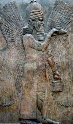 an egyptian relief depicting the god and goddess