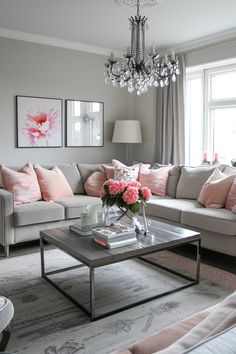 a living room filled with furniture and a chandelier