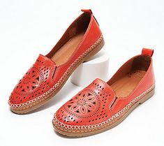 These leather slip-ons boast an intricately designed, perforated upper that demands attention. Whether you choose to wear them with your go-to jeans, a cute maxi dress, or shorts during those warm summer months, they're destined to radiate your sense of style for all to enjoy. From Spring Step. Leather Slip-ons With Woven Sole For Summer, Leather Slip-ons With Woven Sole For Spring, Comfortable Leather Slip-ons For Spring, Spring Leather Slip-ons With Textured Sole, Spring Flat Heel Slip-ons With Perforations, Summer Leather Slip-ons With Woven Sole, Red Slip-ons For Summer, Comfortable Slip-ons With Leather Sole For Spring, Comfortable Brown Slip-ons For Summer