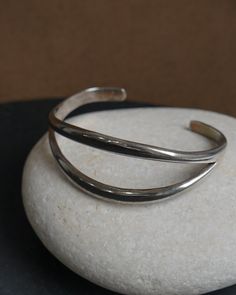 Sterling silver Approx. 2.25" inside, 1" open Made in Mexico Modern Cuff Bracelet With Oxidized Finish, Modernist Open Band Jewelry With Polished Finish, Modern Cuff Bracelet With Oxidized Finish As Gift, Modern Oxidized Finish Cuff Bracelet As A Gift, Modern Oxidized Finish Cuff Bracelet, Sterling Silver Cuff Bracelet With Polished Finish, Modern Oxidized Cuff Bracelet Bangle, Modern Silver Cuff Bracelet With Oxidized Finish, Modern Oxidized Finish Cuff Bracelet Bangle