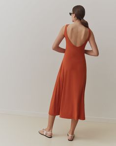 A 3-in-1 dress perfectly fitted for all of your summer activities, made from soft and breathable Pima cotton. Wear the dress on its own without the cropped top for a more sensual look, or with it as an extra layer for more coverage. The cropped top can also be worn on its own, with a summer pants or shorts to complete the look. Chic Stretch Modal Dresses, Beach Cotton Stretch Midi Dress, Beach Stretch Cotton Midi Dress, Cotton Stretch Beach Midi Dress, Summer Loungewear Midi Dress, Summer Modal Dresses For Loungewear, Spring Loungewear Dress, Spring Modal Dress For Loungewear, Spring Loungewear Dress Made Of Modal