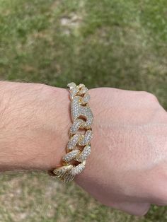 FAST SHIPPING!*TRUSTED SELLER**2300+ TRANSACTIONS* -Will be shipped through USPS with First Class Mail that includes tracking so you'll get it quick! -Don't confuse this with those cheap low quality cuban links that have glued in stones. -Premium 14k white gold OR 14k yellow gold plated diamond figaro cuban link Bracelet! -Plating is PVD which is the highest quality. -Stones are high quality VVS simulated lab diamonds(CZ)! Hand prong set and not glued in like the cheap ones! -Very nice box clasp Gold Chain Link Jewelry With Diamond Accents, Gold Bling Link Jewelry, Cuban Link Diamond Bracelet With Diamond Accents, Cuban Link Diamond Bracelet With Accents, Formal Cuban Link Chain Bracelet With Cubic Zirconia, Gold Cuban Link Jewelry With Cubic Zirconia, Diamond Cut Cubic Zirconia Bangle Bracelet, Classic Cuban Link Chain Bracelet With Diamond Accents, White Gold Cuban Link Bracelet As Gift