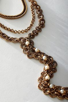 Absolutely adorn your neck with this chunky, layered chain necklace. **Features:** Layered style, multi-chain design, dangling centerpiece, chain fringe, adjustable clasp closure **Why We | Evelyn Necklace by Free People in Gold Multi-strand Chunky Chain Jewelry For Parties, Multi-strand Metal Necklace With Chunky Chain, Metal Multi-strand Necklace With Chunky Chain, Elegant Metal Bib Necklace With Chain Detail, Elegant Metal Bib Necklace With Chain, Chic Multi-strand Layered Metal Necklace, Elegant Metal Layered Necklace With Chunky Chain, Elegant Metal Chain Link Layered Necklace, Chic Multi-strand Layered Necklace