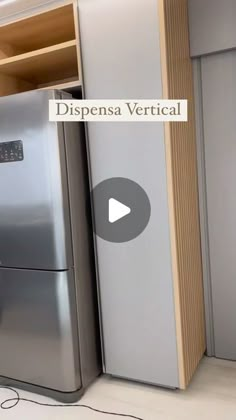 a silver refrigerator freezer sitting inside of a kitchen