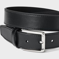 Whether you’re working in the office or lunching with friends, this Dress Belt from Goodfellow & Co™ adds the perfect finishing touch to your look. This dress belt is made from bonded leather for a comfortable and classic look. It also has a shiny silver buckle closure to complete the classy look and allows you to get a customized fit with multiple holes and loop. Pair with any of your pants to feel great all day. Goodfellow & Co™: Where style & fit are always in good company. Black Belt For Office Wear, Fitted Black Belt For Office, Classic Black Belt For Workwear, Classic Black Belt For Work, Black Belt For Workwear, Fitted Black Belt For Workwear, Modern Fitted Belt For Work, In Good Company, Dress Belt