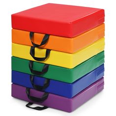 a stack of multicolored plastic storage boxes with handles and straps on each side