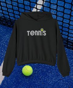 Retro Tennis Sweatshirt, Sports Mom Shirt, Tennis Club Sweater, Tennis Shirt, Women's Sweatshirt, Cinched Bottom Hoodie, and Tennis Gift for Her. Style stacked upon style: this hoodie is an absolute must for any cold day. Made with a boxy, oversized fit, it hits all the cozy marks one needs to feel at home wherever they are. The mid-length design along with the cinched elastic hem, add extra fashion points for any casual outing while the 52% Airlume cotton and 48% ring-spun cotton/polyester fleece blend feels impeccable to the touch.  PRODUCT INFORMATION .: 52% Airlume combed and ringspun cotton, 48% polyester (Athletic Heather is 90/10 Airlume combed and ring-spun cotton/polyester fleece) .: Medium-heavy fabric (8 oz/yd² (271 g/m .: Oversized fit .: Tear-away label CARE INSTRUCTIONS: Turn Sporty Sweatshirt With Drawstring Hood For Workout, Sporty Workout Sweatshirt With Drawstring Hood, Moisture-wicking Hooded Tops For Sports Events, Sportswear Hooded Tops With Letter Print, Sporty Sweatshirt With Drawstring Hood For Sports Season, Sporty Hooded Sweats For Sports Season, Sporty Hooded Sweatshirt, Sports Sweatshirt With Drawstring Hood And Crew Neck, Sporty Hooded Sweatshirt With Letter Print