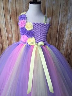 FREE SHIPPING on all orders within the US, no coupon code needed! Lavender Tutu dress by Little Ladybug Tutus. Handmade Tutus for girls specializing in birthday party dresses, Halloween costumes, flower girl dresses, pageant tutus, 1st birthday tutus, and blinged Converse sneakers. We accept custom orders! ORDER PRODUCTION TIME Please check the top of our website's home page for current turn around time. Since all items are handmade at the time of purchase, there is a production time that varies Lavender Fitted Princess Dress For Dress-up, Lavender Princess Dress For Dress-up, Spring Birthday Princess Dress In Purple, Spring Birthday Purple Princess Dress, Purple Princess Dress For Birthday In Spring, Lavender Princess Dress For Dress-up Occasions, Purple Spring Birthday Dress, Purple Summer Birthday Dress, Whimsical Fitted Lavender Dress