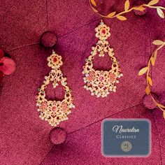 Giving out an elegant vibe owing to its sparkling stone mix! A versatile pair of earrings encrusted with nauratan stones and pearl moti. Approximate earrings length is 4". Pair Niti Earrings with Zehna Teekah for a complete festive look. Gold-plated on high-quality brass as base metal. Made by order. Kindly allow 4-6 weeks for the delivery of this item. For custom or urgent requests, please contact support@alacouture.com. *Please Note: We use faux stones and beads in all of our jewelry. Temple Jewelry Chandelier Earrings With Pearl Drop For Festivals, Festive Temple Jewelry Pearl Drop Earrings, Festive Pearl Drop Earrings For Celebration, Festive Celebration Pearl Drop Earrings, Pearl Drop Earrings For Festive Celebrations, Festive Jeweled Chandbali Pearl Earrings, Festive Temple Jewelry Pearl Drop Danglers, Traditional Jeweled Pearl Earrings For Celebration, Festive Fusion Style Pearl Drop Danglers