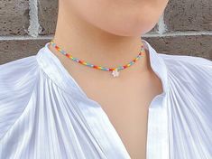 "This chic, colorful but simple necklace will add an extra ✨ to your everyday style. You can layer it with your favorite accessory or wear it on its own! P R O D U C T * D E T A I L S Materials :: premium seed beads, gold-plated clasp Chain Length :: 14\" / 16\" / 18\" C A R E * I N S T R U C T I O N S Please remember that all our jewelry is handmade, so handle it with care and love. Also note that gold or silver-colored pieces may tarnish over time depending on the frequency of use and care taken when using the items. To prolong the life of these pieces, we strongly advise storing them separately, away from direct sunlight and moisture, and avoid wearing them near water. Handcrafted by FOR MY MUSE" Multicolor Choker Necklaces For Spring, Multicolor Spring Choker Jewelry, Multicolor Choker Jewelry For Spring, Multicolor Choker Necklace For Spring, Multicolor Choker For Spring, Spring Multicolor Choker Jewelry, Casual Beaded Necklaces For Spring Gift, Casual Spring Jewelry With Tiny Beads, Casual Beaded Necklace For Spring Season Gift