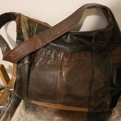 Beautiful One Of A Kind Shoulder Bag With Authentic Leather Patchwork. Cotton Interior Lining With Singe Zip-Pocket. Three Outer Pockets, Comfortable Should Length. Could Wear As A Crossbody As A Snug Fit. Good Used Condition, Originally Purchased New With Tags From Independent American Craftsman. Vintage Brown Leather Shoulder Bag With Waxed Finish, Vintage Distressed Brown Leather Shoulder Bag, Distressed Brown Leather-lined Satchel Bag, Vintage Brown Patchwork Shoulder Bag, Distressed Brown Leather-lined Satchel Shoulder Bag, American Craftsman, Leather Patchwork, Beautiful One, Leather Satchel