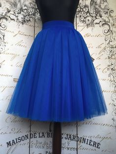 "Beautiful tulle skirt from soft Italian tulle for every day or special occasion. All skirts are made from 4-6 layers tulle, soft lining and elastic waistband for perfect fit and comfort. Each item are handmade and excelent quality. Usually tulle skirt sewing takes about 1 week. Shipping to US - 10 till 14 days, to UK - 5 till 7 days. If you need skirt for a specific date, please write it in the order notes. The model is 5.6ft tall and wears 26\" skirt length (6 layers). The length of the skirt Blue Tulle Skirt For Summer, Blue Long Tulle Skirt, Blue Tiered Tulle Skirt, Blue Tulle Long Skirt, Blue Full Tulle Skirt, Tulle Pleated Skirt For Summer, Blue Long Tulle Skirt Dresses, Blue Long Tulle Dress, Blue Flared Tulle Skirt