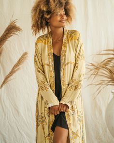 Our Short Kimono offers an easy, relaxed fit, combining comfort with understated elegance. Its fluid silhouette adds a touch of effortless charm to any outfit, making it a versatile piece for both casual days and special moments. Casual Long Sleeve Rayon Kimono, Long Sleeve Rayon Kimono For Spring, Casual V-neck Kimono For Loungewear, Casual V-neck Rayon Kimono, Fall Kimono With Relaxed Fit For Loungewear, Relaxed Fit V-neck Kimono For Loungewear, Casual Relaxed Fit Kimono For Loungewear, Bohemian V-neck Sleepwear For Spring, Bohemian V-neck Spring Sleepwear