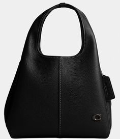 From COACH&#x2C; the Lana 23 Polished Pebble Leather Solid Black Shoulder Bag features:Magnetic snap closureLeather and fabric liningSide open compartmentsHandles with 5" dropDetachable strap with 21.5" drop for shoulder or crossbody wearApprox.: 8.75" L x 12.5" H x 5.5" WImported. Classic Business Bags With Pebbled Texture, Business Leather Bags With Pebbled Texture, Leather Shoulder Bag With Pebbled Texture And Top Handle, Leather Top Handle Shoulder Bag With Pebbled Texture, Leather Top Handle Bag With Pebbled Texture, Black Pebbled Leather Shoulder Bag With Silver-tone Hardware, Black Pebbled Leather Shoulder Bag With Soft Leather, Classic Top Handle Bag With Pebbled Texture, Classic Bags With Pebbled Texture And Top Handle