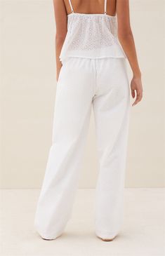 Get ready for sunny days ahead with the Beverly and Beck Eyelet Pants. These pants feature a comfortable drawstring waistline and convenient side pockets. Made from a lightweight cotton with eyelet detailing throughout, they're the perfect combination of style and comfort for the warmer weather. Whether you're strolling on the beach or enjoying a brunch with friends, these pants are a must-have


	Drawstring waistline
	Side pockets
	Lined
	Lightweight
	Floral eyelet design
	10.5" rise
	Mid- Summer Trip Outfits, Eyelet Pants, Refer A Friend, Brunch With Friends, Trip Outfits, Summer Trip, White Eyelet, Pajama Bottoms, Off Duty