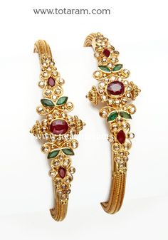 22 Karat Fine Gold Uncut Diamond Kada with Rubies & Emeralds - Set of 2 (1 Pair)
     Width at the Center of the Kada : 19.0 mm
  
  Note: This item comes with a Screw and hinge so that you can open it up for easy wearing.            
  Internal reference code: 2-4 - 235-GK350 - in 38.850 Grams for USD $3499.39. 
Made in India by Totaram Jewelers Online this product is in Gold - 22 Karat BIS Hallmark 916 KDM Gold  & is an excellent gift for Adult - Women. Ships fully insured with secured Diamond Kada, 22 Karat Gold Jewelry, Indian Gold Jewellery Design, 22k Gold Bangles, Gold Bangles For Women, Beautiful Gold Necklaces, Bangles Making, Bangles Jewelry Designs, Gold Jewelry Simple